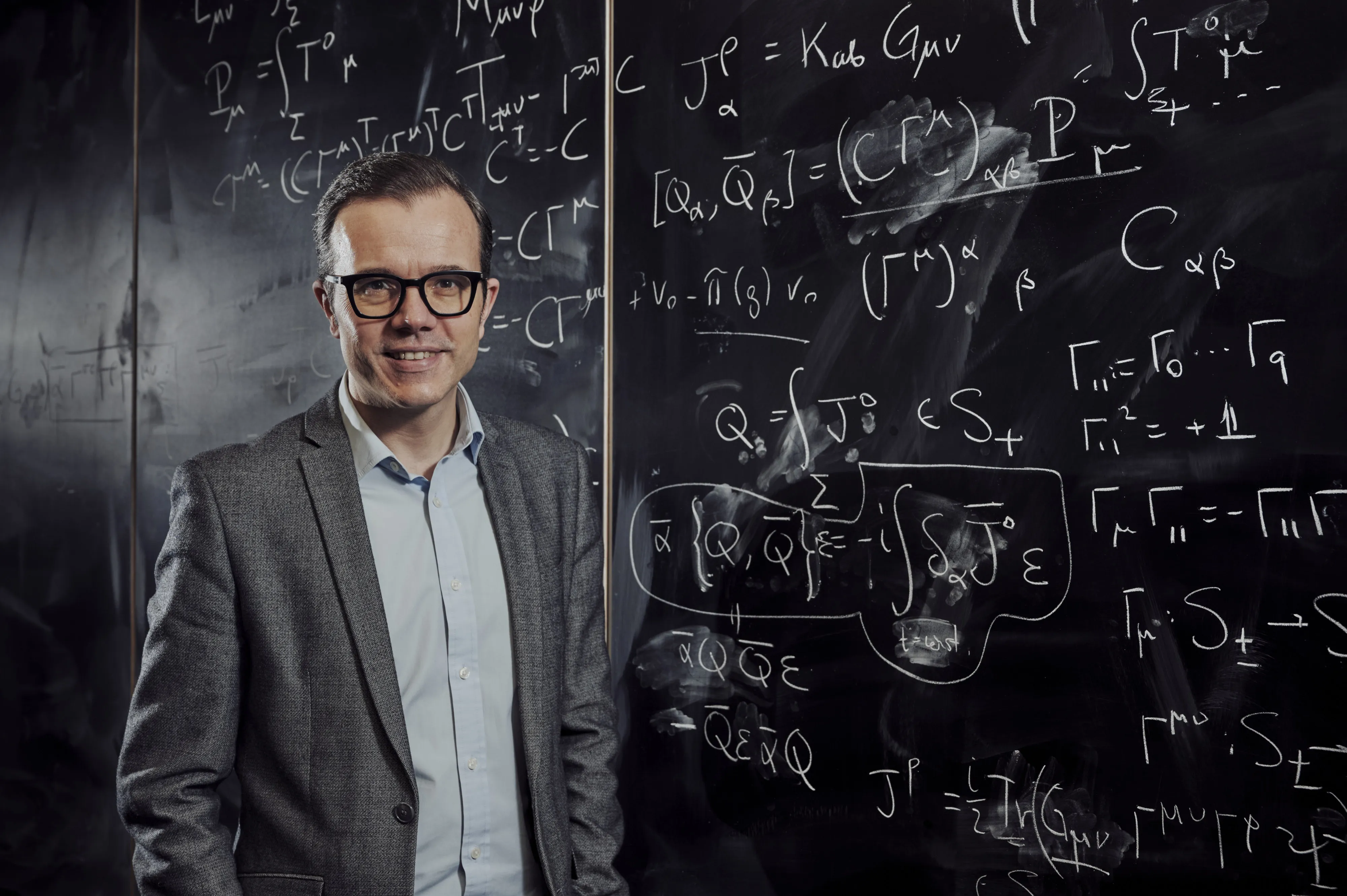 Michael Rovatsos by a blackboard of equations 