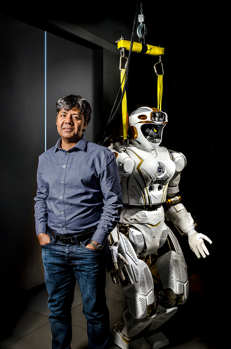 Professor Sethu Vijayakumar with the Valkyrie robot