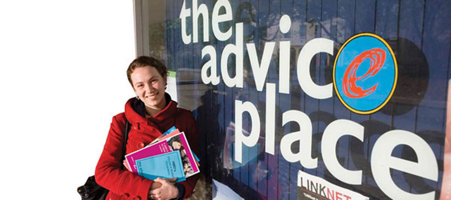 female student standing in front of the Advice Place